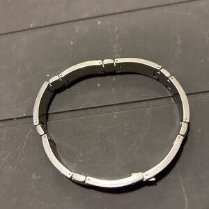 Men’s Silvertone Stainless Steel Bracelet. 8” L in Open Position. 4” in Closed